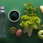 assorted fruits and vegetables on green surface